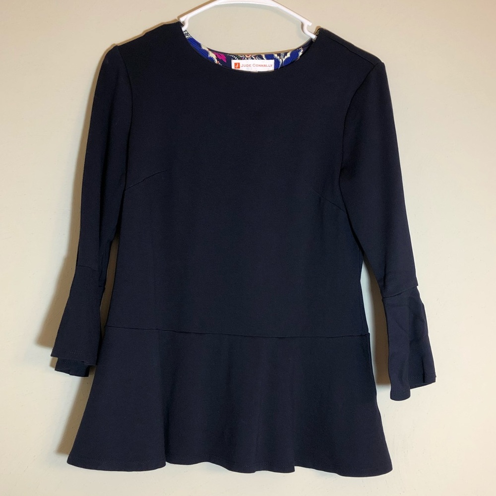 Navy bell sleeve peplum shirt.